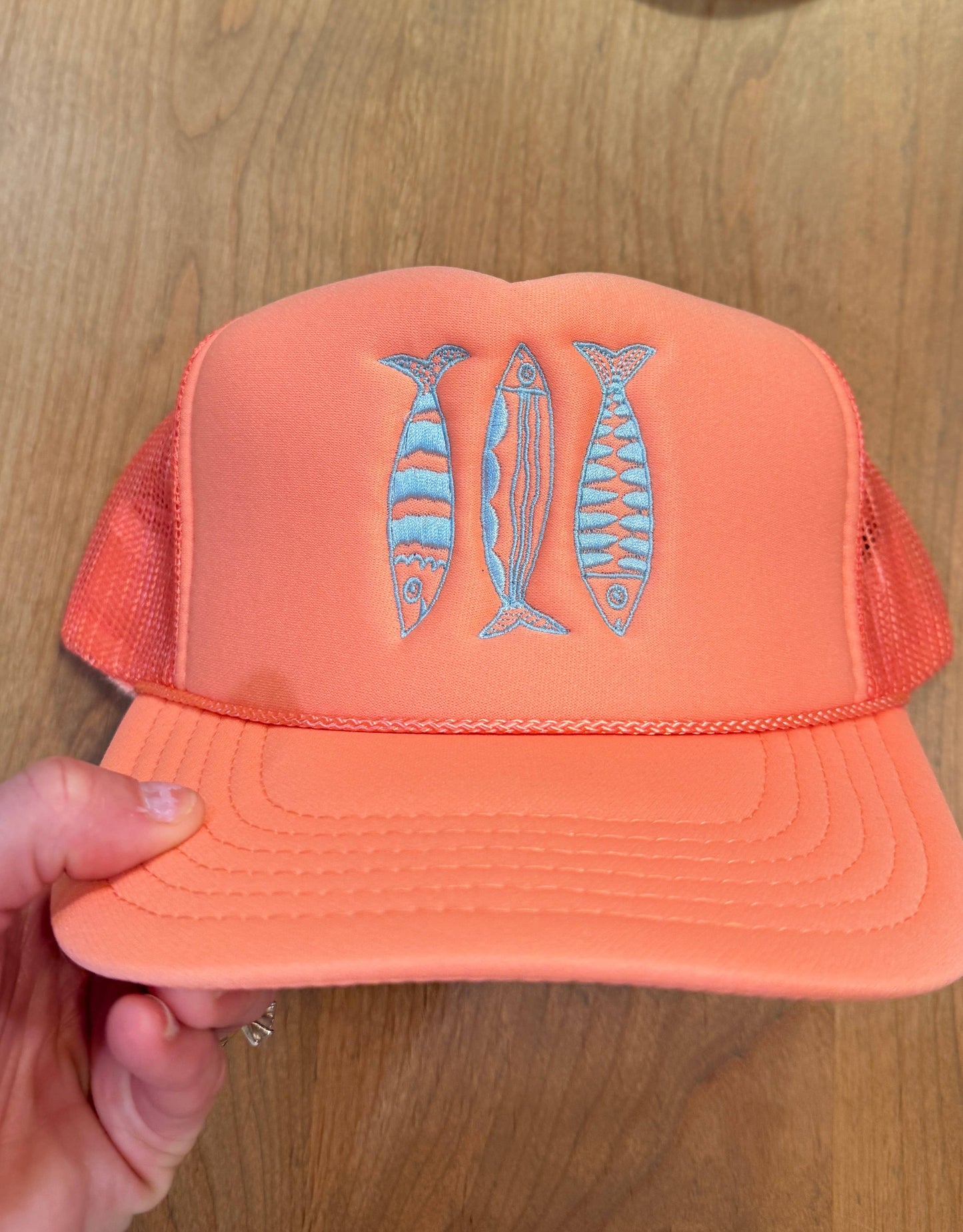 Sardine Summer Trucker Hat: Coral hat | light blue thread